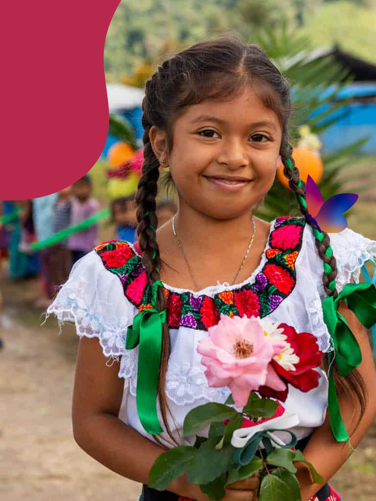 A child with flowers, representing hope and cultural connection